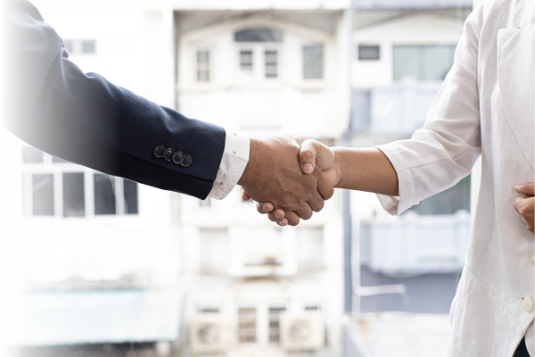 Two people shaking hands