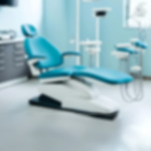 A blue dentist chair at a dentistry.