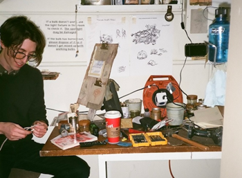 Lucas Glenn working in his workshop.