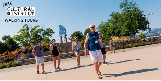 A guide leads a Cultural District Walking Tour.