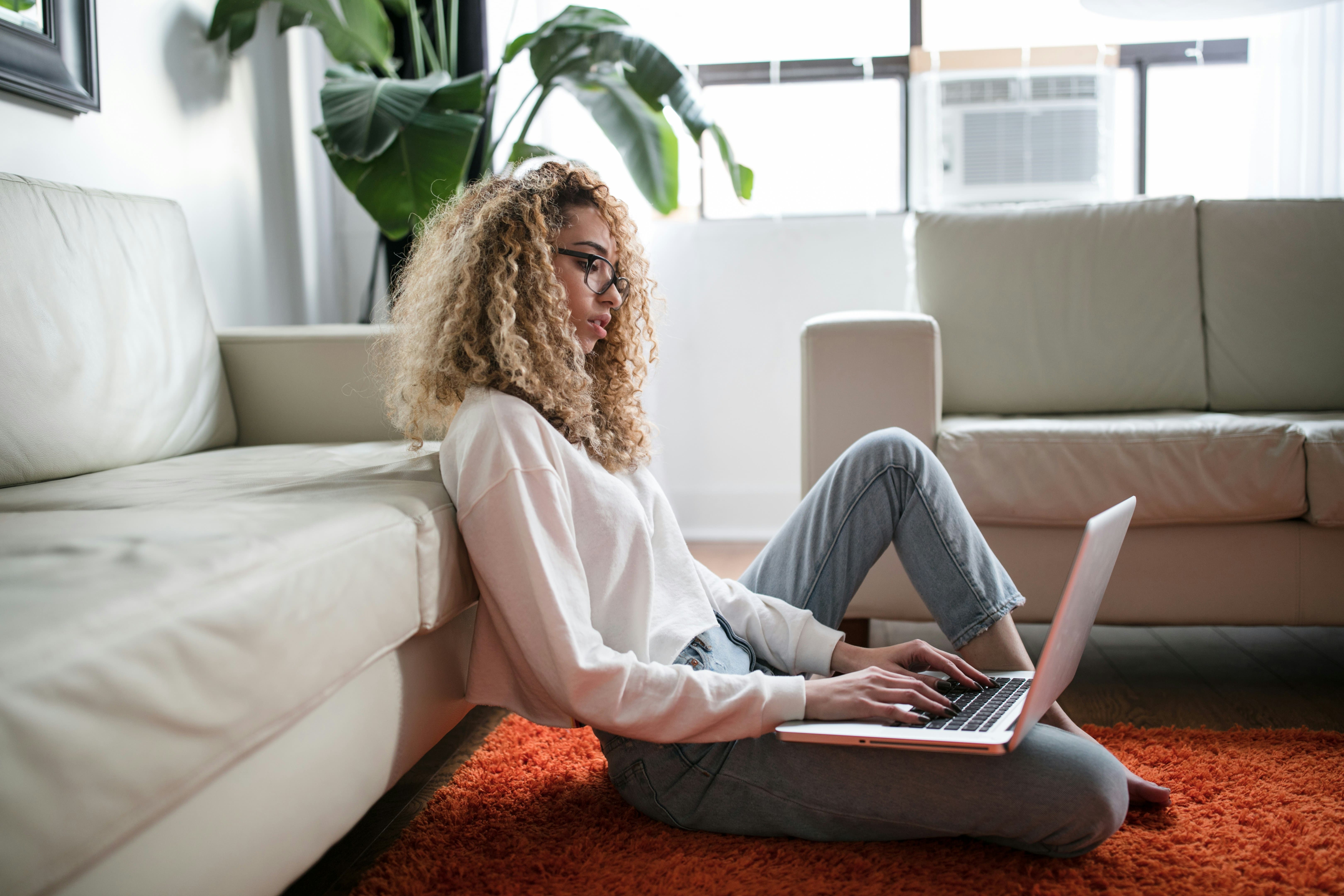 User sitting with laptop